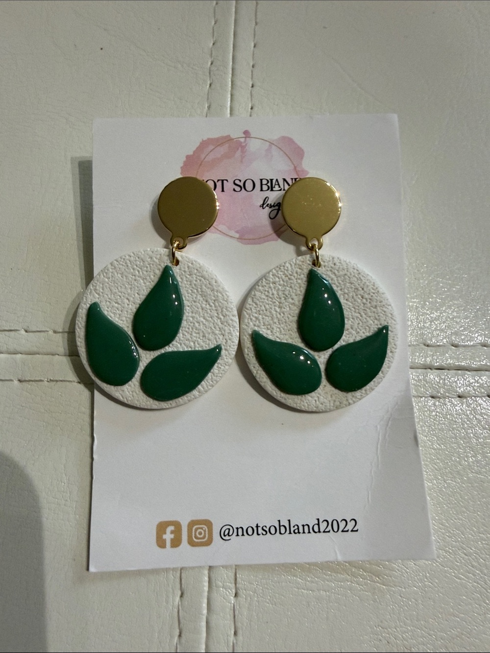 Green Leaf Drop Earrings on White Discs